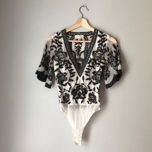 Beautiful cream bodysuit